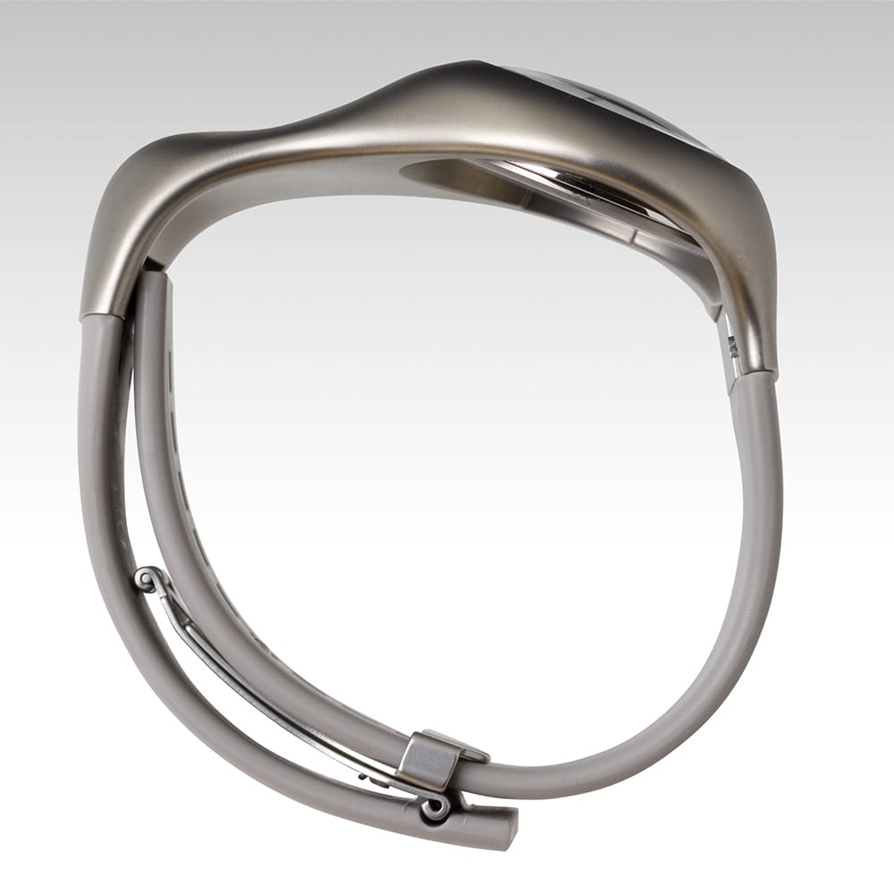 Gentle Shape 2.<span>The main body’s curved surfaces, formed from a titanium board, tenderly enfold your wrist (arm) while representing a dynamic flow. You can feel Mr. Ross Lovegrove’s human concept from a smooth texture of the watch. The watch is designed to fit into an average Japanese male’s wrist.</span>